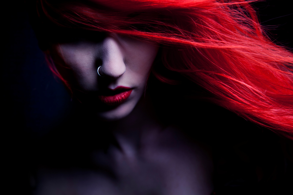 Red Haired Woman With Red Lipstick